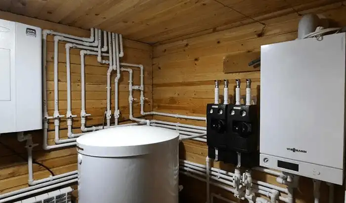 Профессиональная установка настенного газового котла Viessmann Vitodens и бойлера косвенного нагрева Vitocell.